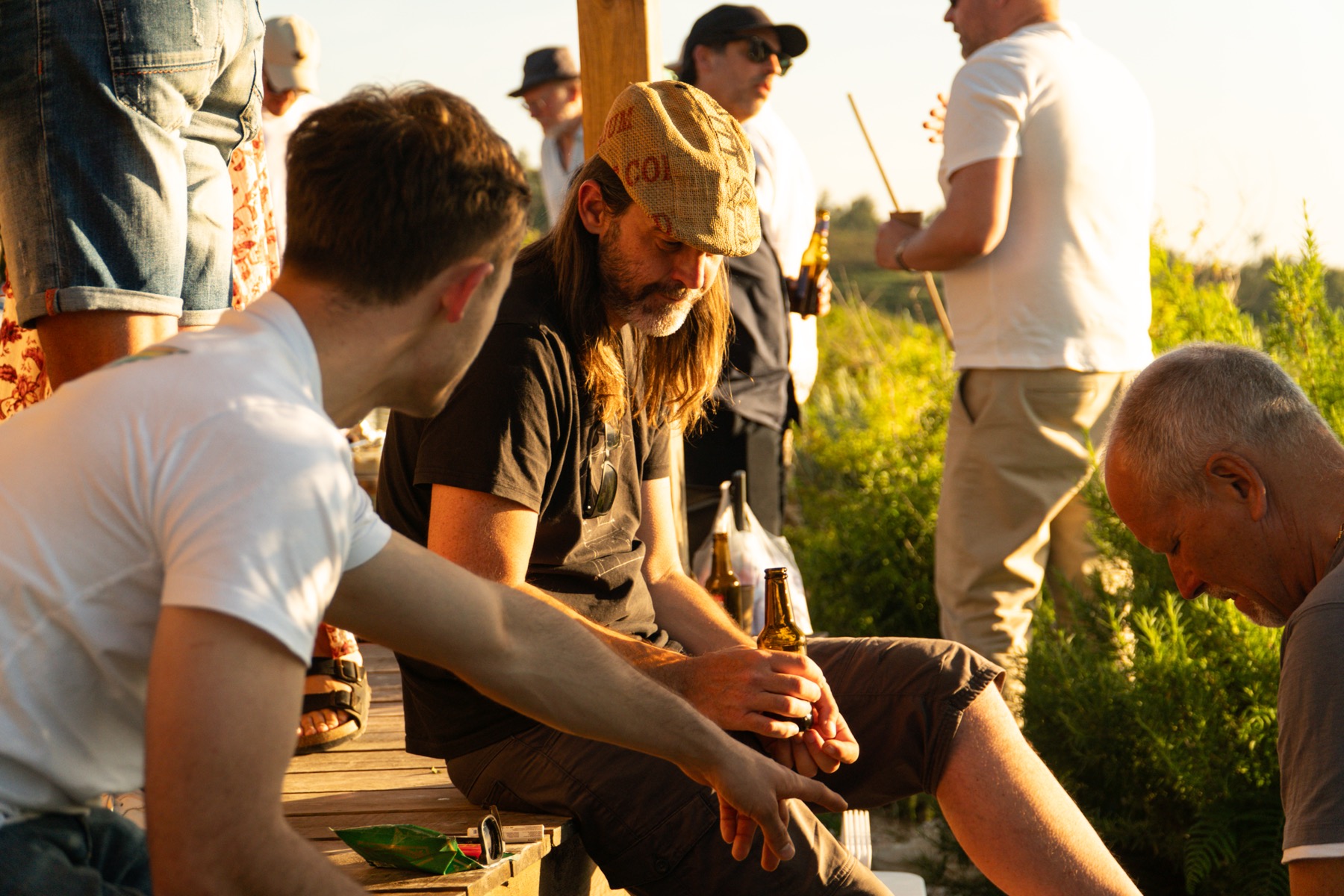 Golden-hour conversation after the pitches.